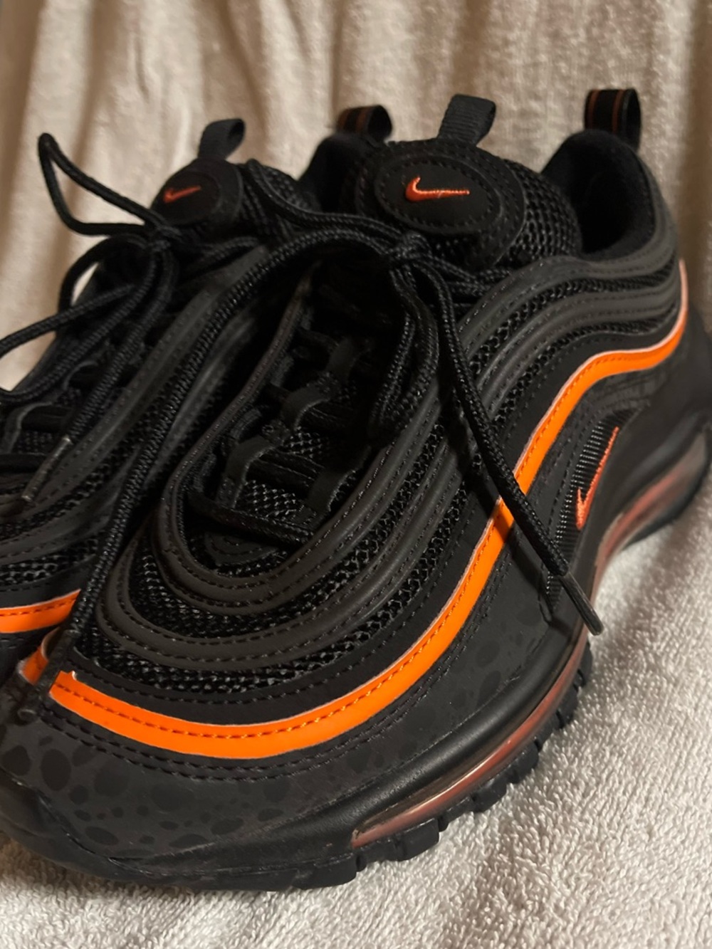 Nike Black Sneakers with Orange Stripe